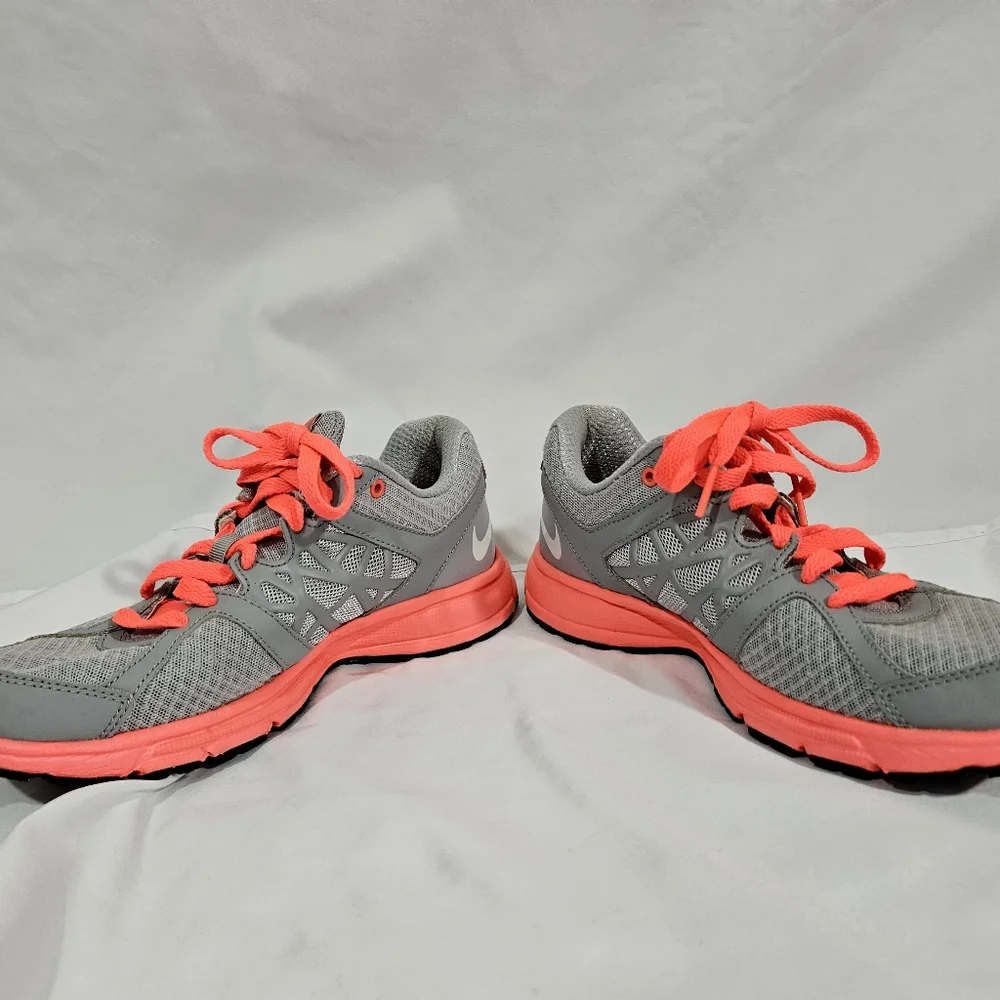 Nike neon pink and grey athletic shoes women's size 7.5
